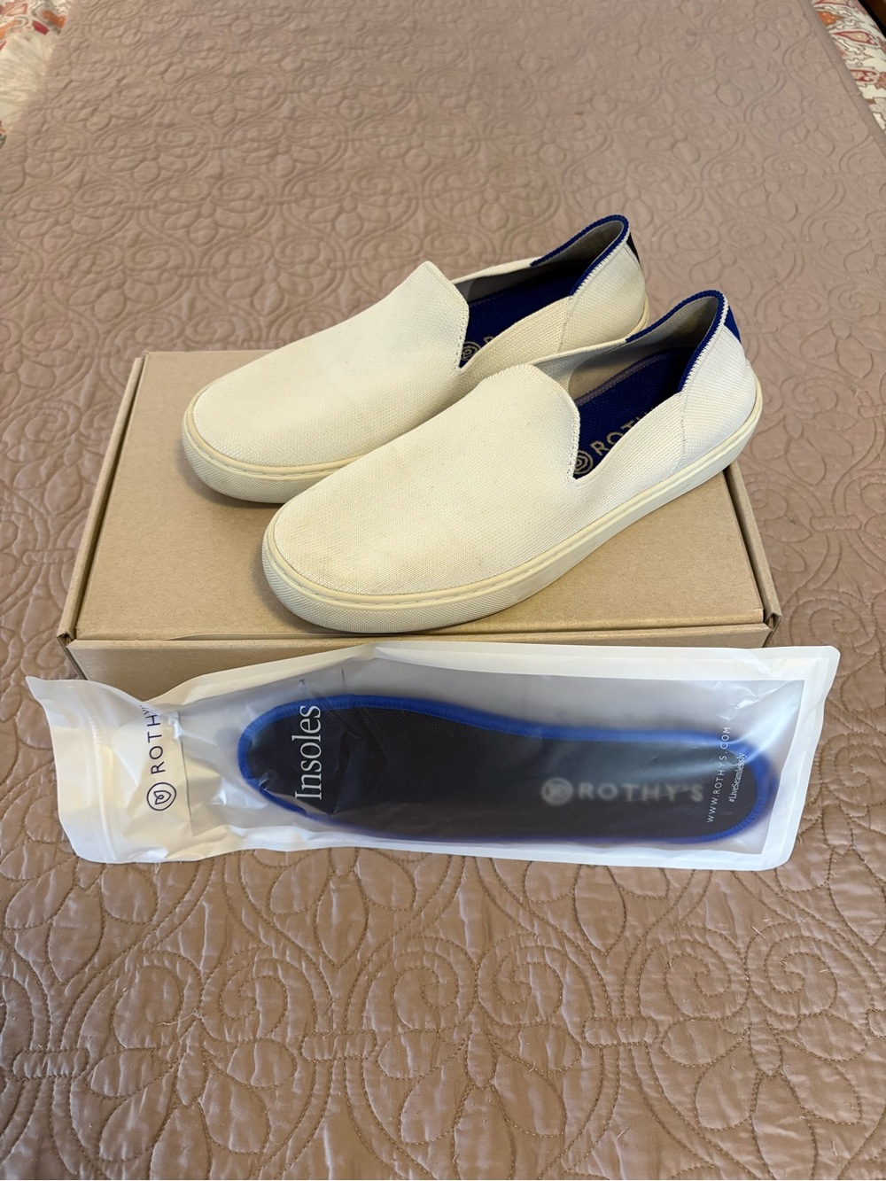 Rothy's Woman’s Slip-On Canvas Sneakers in Light Cream with Blue Trim